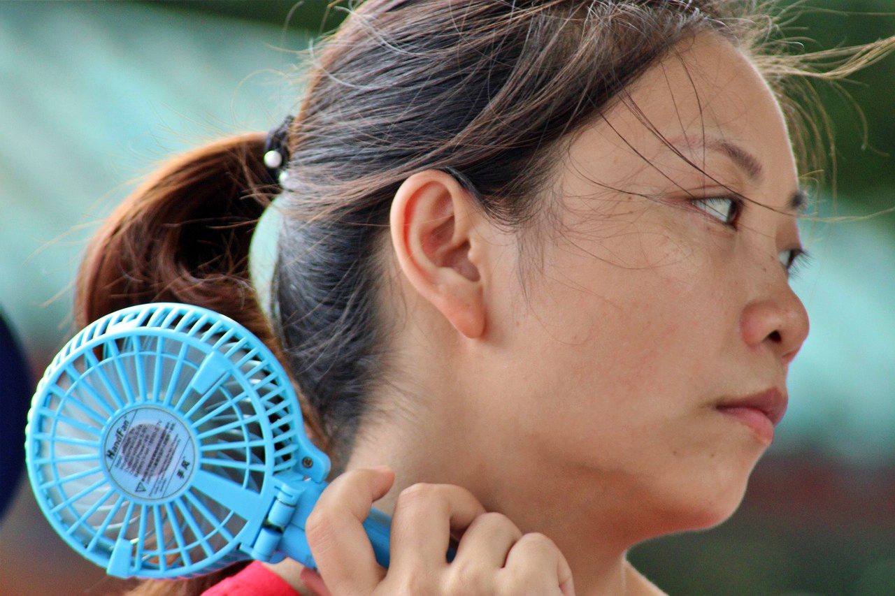 Carry a fan in a heatwave