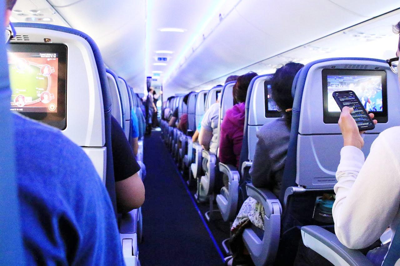 Passengers seated on a plane